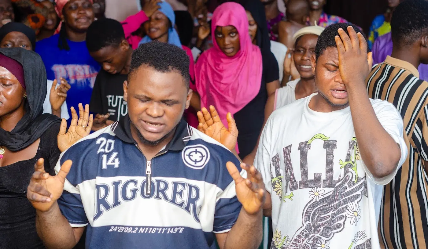 Worship & Word 2026 · New Wine: worshippers praying and praising at Adoration New Life Ministry, Aiyepe, Ijebu