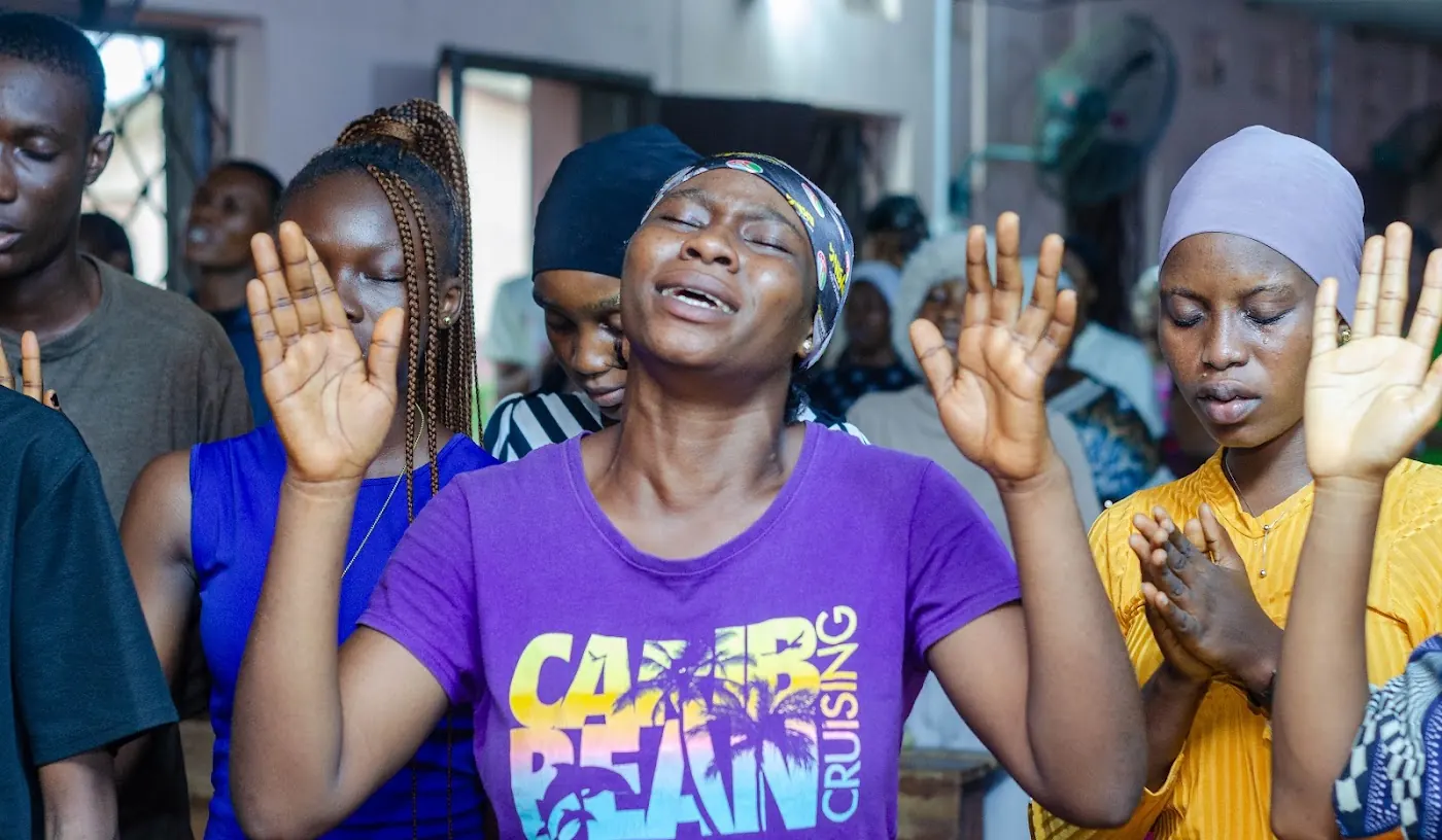 Worship & Word 2026 · New Wine: worshippers praying and praising at Adoration New Life Ministry, Aiyepe, Ijebu