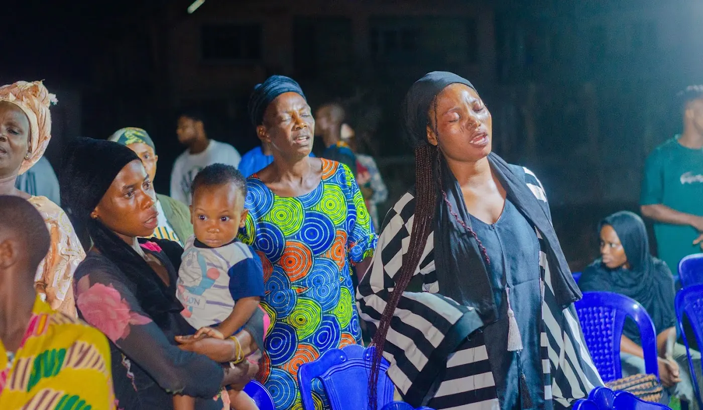 Worship & Word 2026 · New Wine: worshippers praying and praising at Adoration New Life Ministry, Aiyepe, Ijebu